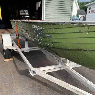 For sale 14FT aluminum boat. Comes with 3.5 hp Mercury motor and heavy duty trailer. May separate it...