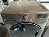 LG steam washer and dryer with pedestals 