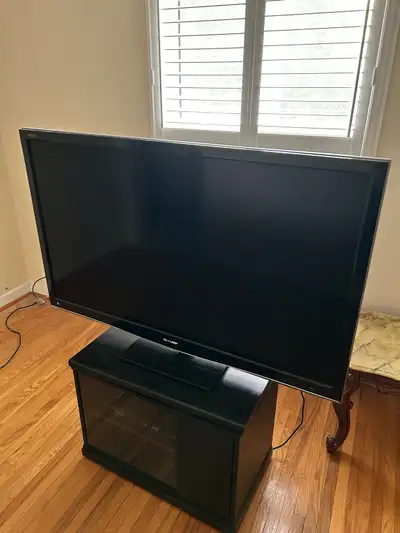 sharp 50” tv with stand, View more