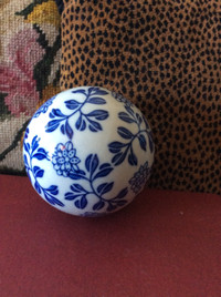 Pretty blue and white porcelain ball, $5