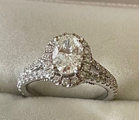 14k .97 Oval center halo engagement ring 