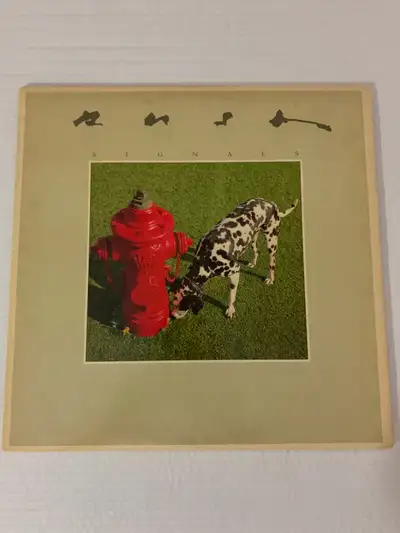 RUSH / SIGNALS VINTAGE FROM 1982 RECORD IS NEAR MINT NM- COVER IS NEAR MINT NM-