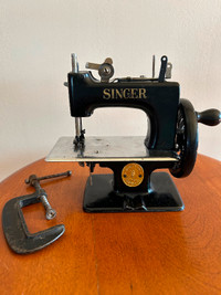 Vintage Singer miniature sewing machine