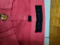 Pink fadded skinny Juicy Couture Jeans w/ Swarovski crystals.