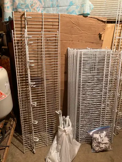 Wire shelves from pantry and closets. 10 pcs 16”x42”, 3 pcs 12”x65” with loops, 1 pcs 16”x 54”, 1 pc...