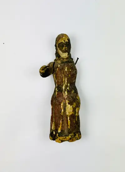 This antique wooden figure, dating back to the 17th century, is a captivating relic from a time when...