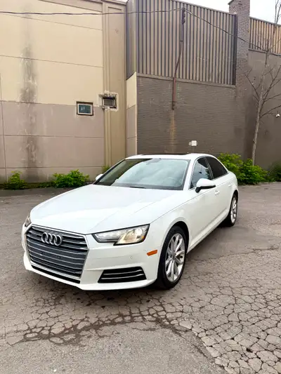2017 Audi A4 Progressiv AWD, automatic, white, with 129,000 km. This is a well-maintained luxury sed...