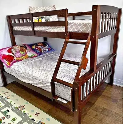 This sturdy, used bunk bed is perfect for kids' rooms or guest rooms, offering a space-saving sleepi...