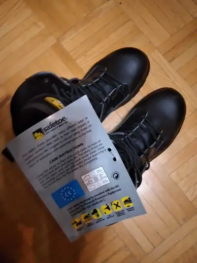 Safety boots., View more