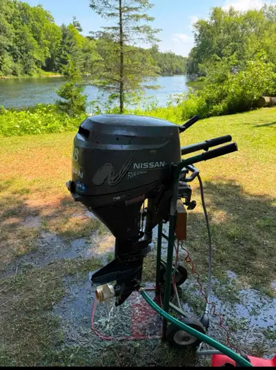 Nissan 9.8 4 Stroke Outboard Motor in good condition. Short Shaft. Tuned up and new gas tank and hos...