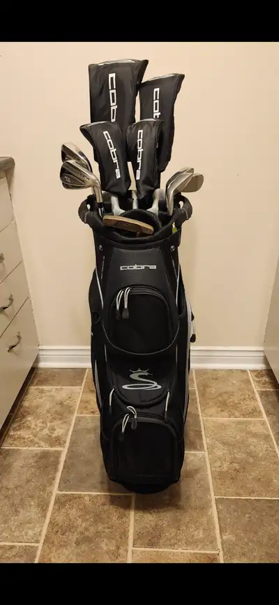 Sold pp..Mens 12 piece Cobra XL Right hand golf clubs., View more