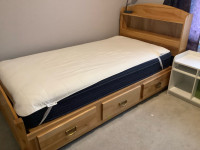 Solid wood Twin captains bed with drawers, Desk and shelves..