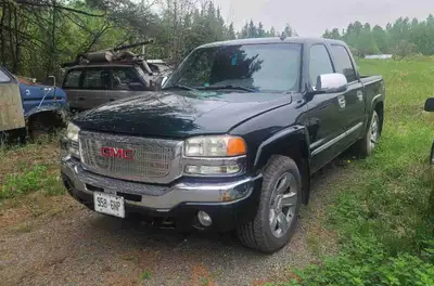 2006 GMC Sierra 1500 4x4 crew cab. 360450klm. Runs good, heads done at 340000klm, rebuilt transmissi...