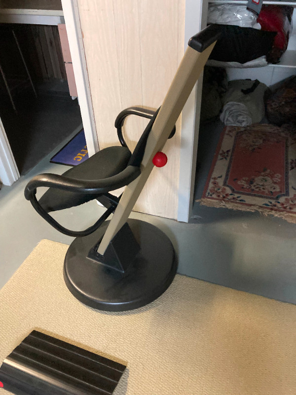 MCM tilting chair! It tilts forward to support your lower back