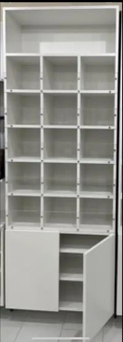 This shelving unit is in excellent condition previously used in a chocolate store. Ready to organize...