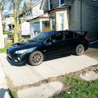 Safetied WRX STI for sale Comes with a set of winter tires and 10,000 KM Michelin Pilot AS4. Really...