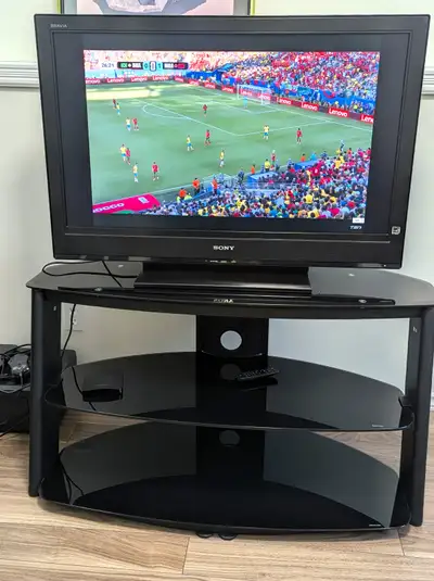 TV Stand and a Sony Bravia 40-inch LCD TV, View more