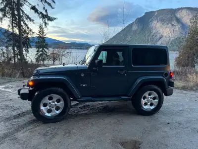Selling our jeep wrangler Sahara 4x4! Love her but we need to make a change with our vehicle situati...