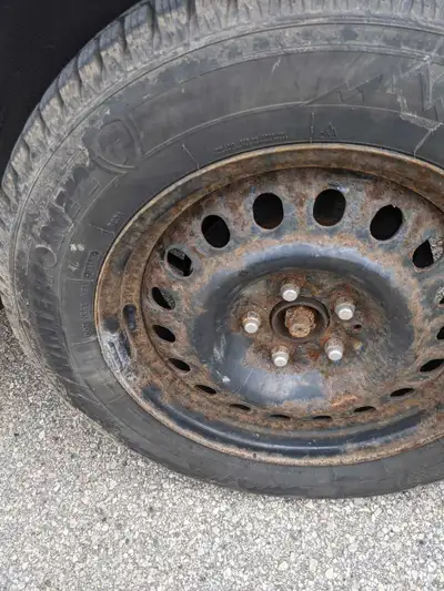 Full set of steel rims with 5 bolt pattern. Tires on them but only 2 tires are usable possibly. Dont...