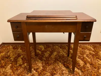 Sewing machine cabinet, 30" high, good condition.