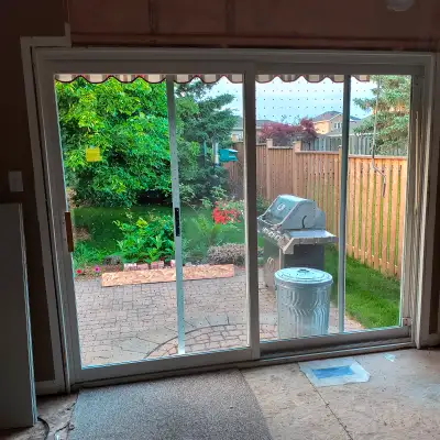 Just like the title says, this is an 8 foot wide sliding patio door, currently configured with handl...