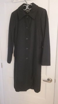 Manteau d’hiver noir, grandeur 9 ans50% laine, 40$ polyester, 5