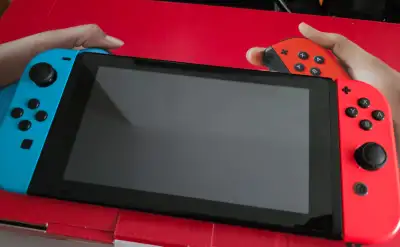 Nintendo Switch with box cables -  10 games 325$  or best offer, View more