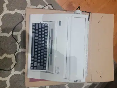 Brand new open box Elctronic Typewriter with box and manual. Pickups only