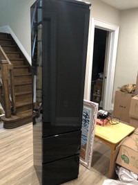 Black lacquer tall storage tower