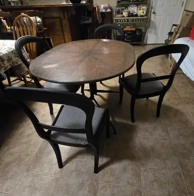 Selling 4 wooden chairs (fabric cushion seats) and wooden table (top - wooden, legs - metal). Dimens...