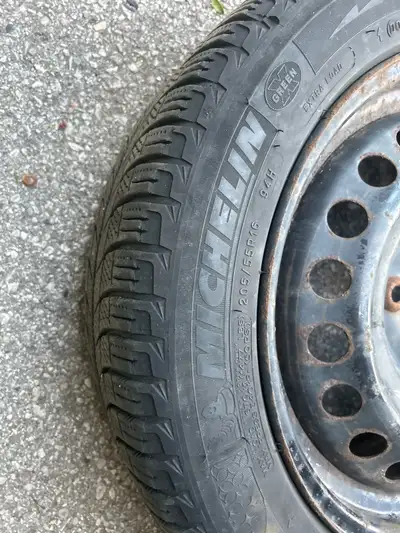 Full size spare. 205 55R16. Michelin X-Ice winter tire on steel rim. 5 x 114.3 bolt pattern. Hub siz...