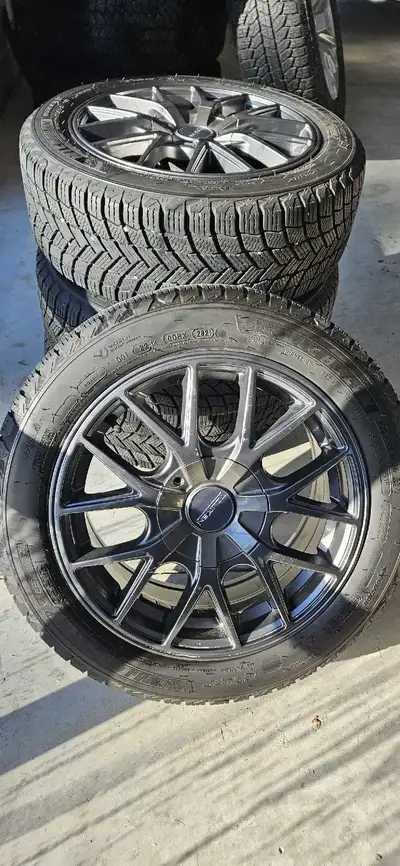 I am selling a set of Michelin X-Ice Snow tires mounted on Touren rims. Used one season. These 195/5...
