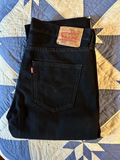 LEVI 501's, 4 pairs, 3 in blue, 1 in Black Black, $40, to $50., View more