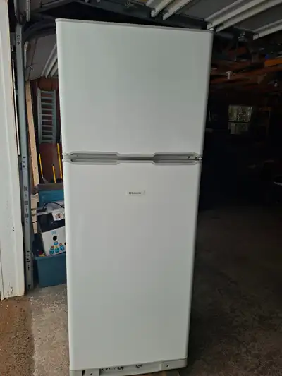 For sale an electric/ propane refrigerator, View more