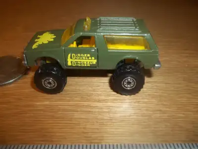 514-247-8483- communiqué Vintage Hot Wheels Chevrolet Digger Douglas Dinosaure digger Mattel inc..19...