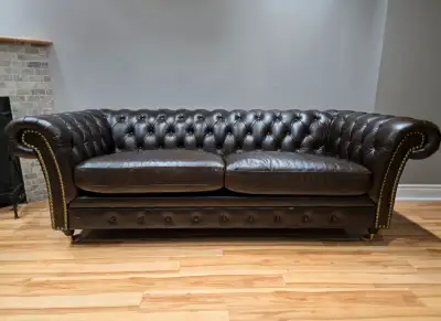 Leather tufted sofa, perfect condition, View more