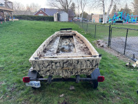 12 ft fibreglass boat motor and trailer 