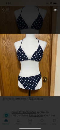 Navy blue polkadot bikini top is a size large and bottoms are a 