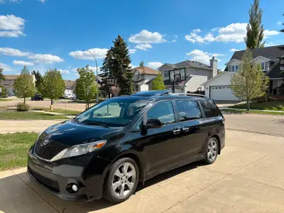I'm selling my used 2014 Toyota Sienna SE, a versatile minivan perfect for families, featuring a sle...