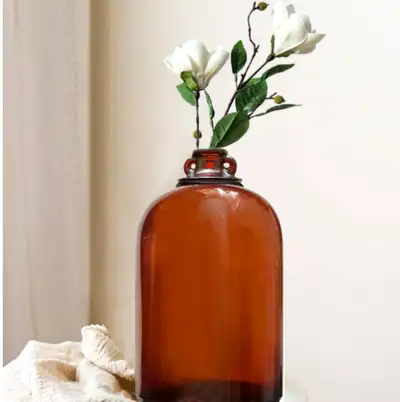 Antique, plus de 100 ans - Cruche en verre ambré-brun à deux anses, qui se fermait avec un bouchon d...