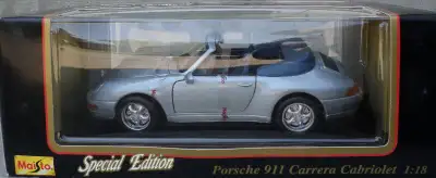 Description Porsche 911 Carrera Cabriolet (1994) - Convertible, Silver Maisto, 1:18 Scale; Special E...