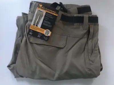 Men's nine pocket cargo pants that convert into shorts. Two zippered security pockets. A pen pocket...