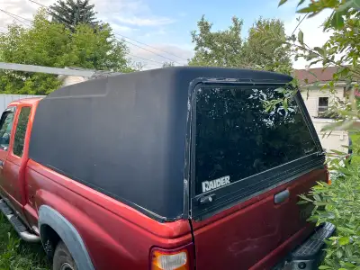 PENDING FOR THE WEEKEND Raider canopy 6 foot box No leaks or cracks Door latches work good Whoever b...
