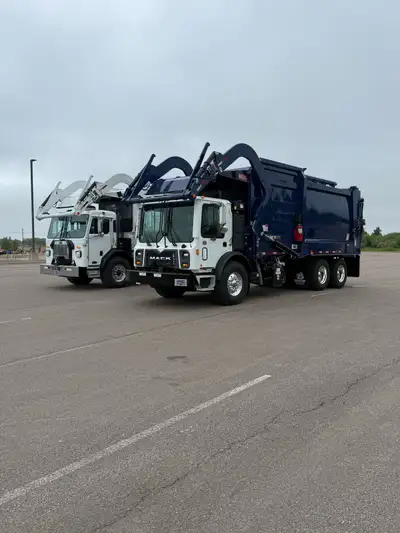 We have two new 2027 front load trucks on the lot and ready for delivery. -2027 Peterbilt 520 with P...