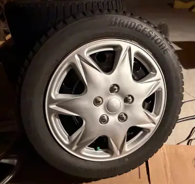 Winters on 16" rims, 5 stud. Stored in crawl space in summers. Approx. 28,000 kms on them. Come with...