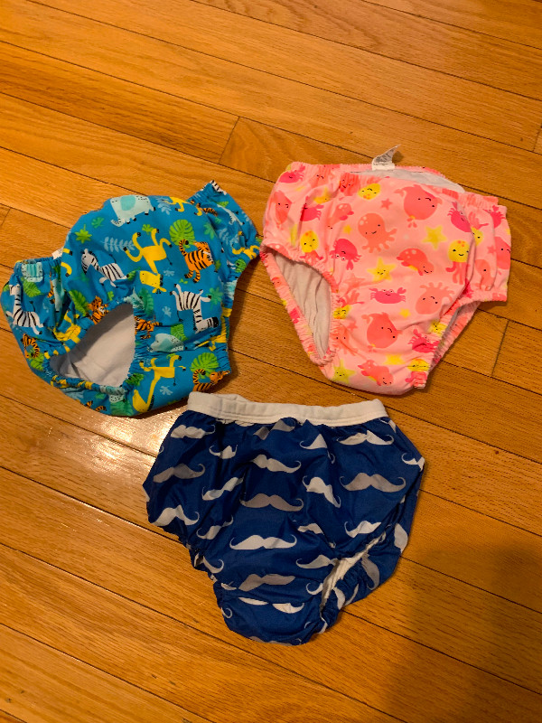 Size medium reusable swimming diapers in Bathing & Changing in Winnipeg