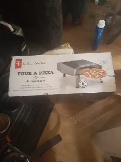 I'm selling a President's Choice propane pizza oven, perfect for making restaurant-style pizzas at h...