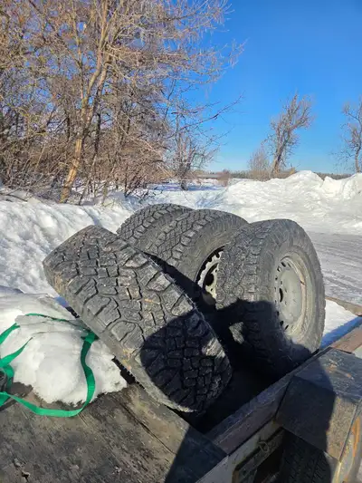 BRAND NEW tires and rims 17" steel rims for chevy half ton 285/75R17 Duratrac tires Bought 5 weeks a...