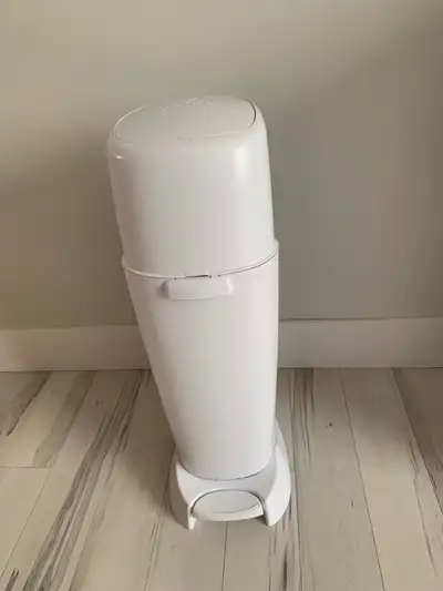 For Sale: Diaper Genie all cleaned and loded with roll of bags ready to go. $40. Located in corner b...