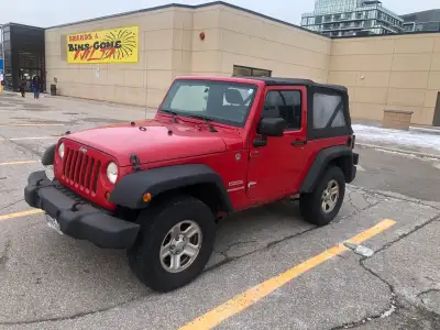 Red Jeep Wrangler Sport, V6 3.6 liter, Pentastar, Manual 6-speed, Soft top, 217000 K, Mostly highway...